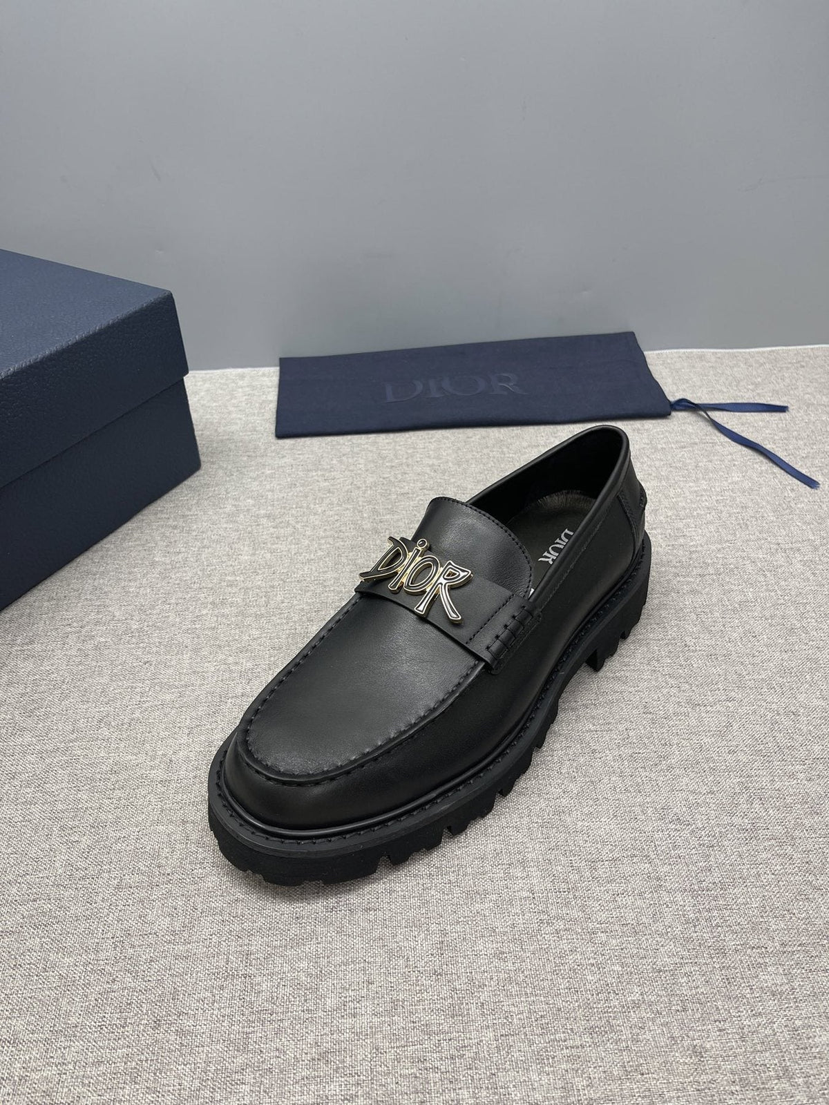 Dior Men's Black Gold-Plaque Slip-On Shoes
